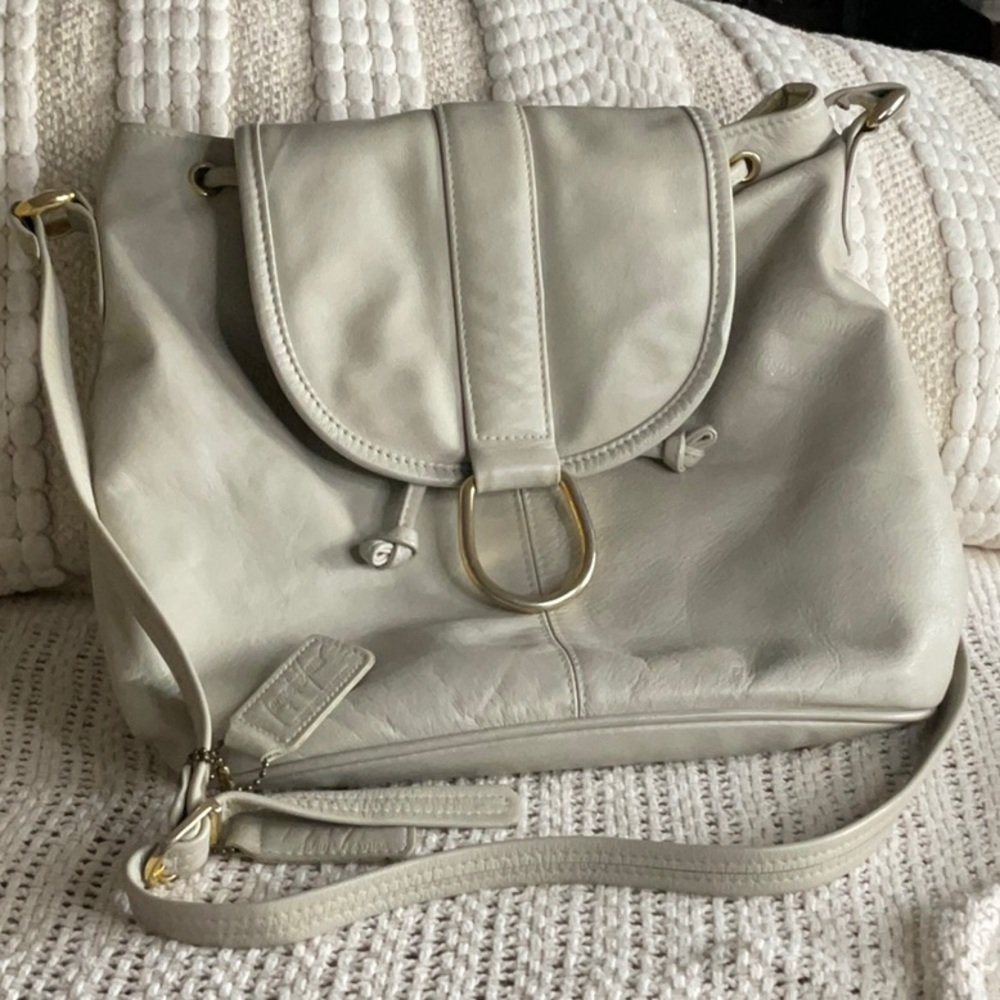 Jacqueline Ferrar genuine Beige leather crossbody bag with adjustable strap.